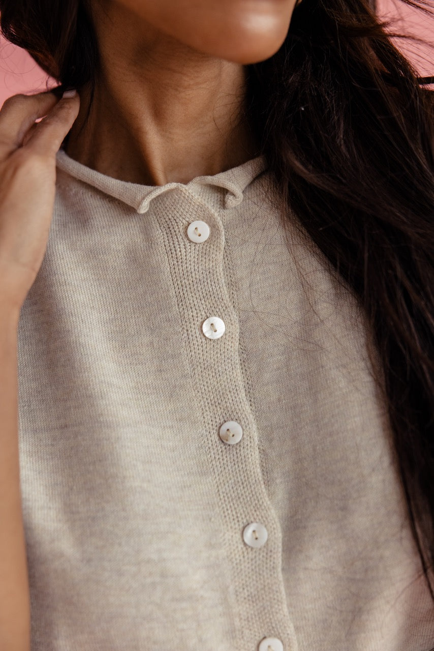 Close up of buttons on a sweater